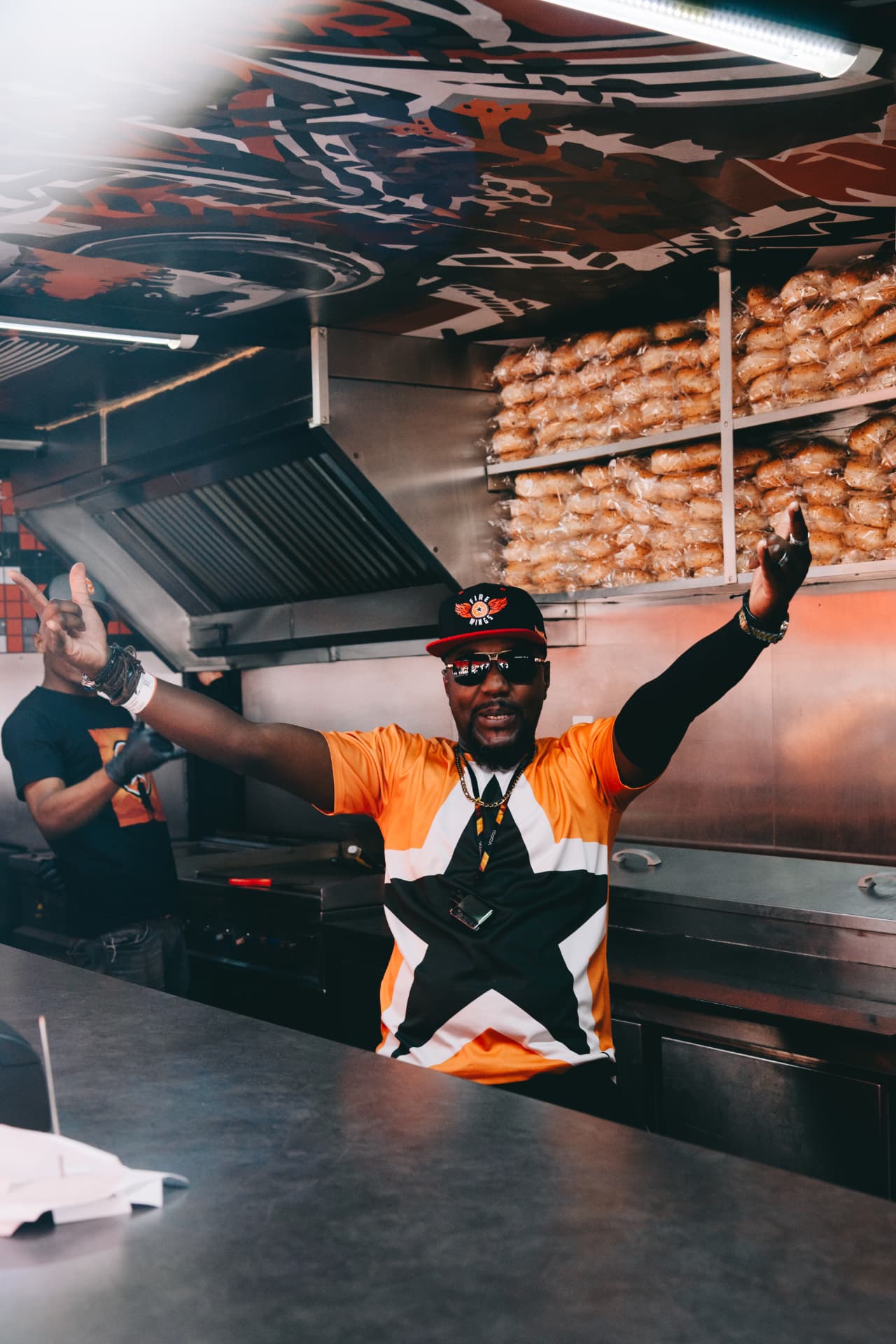 RocoMamas crew member celebrating in the event kitchen